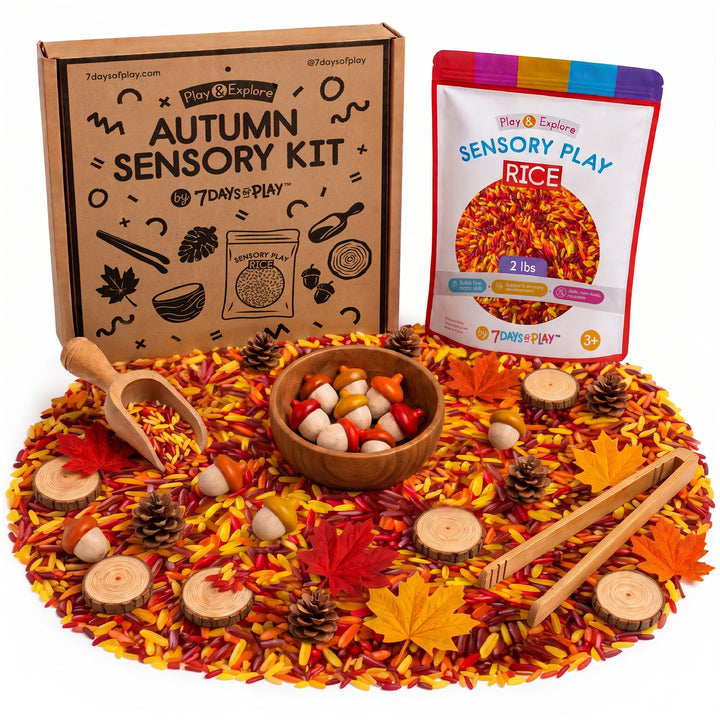 Autumn Sensory Kit box with fall sensory rice, wooden bowl, scoop, bamboo tongs, acorns, pinecones, wood slices and maple leaves