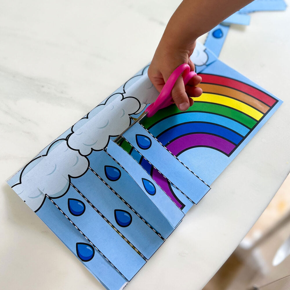 Make cutting practice for preschoolers fun with this activity! Kids will cut away the top layer of paper to reveal a picture underneath!