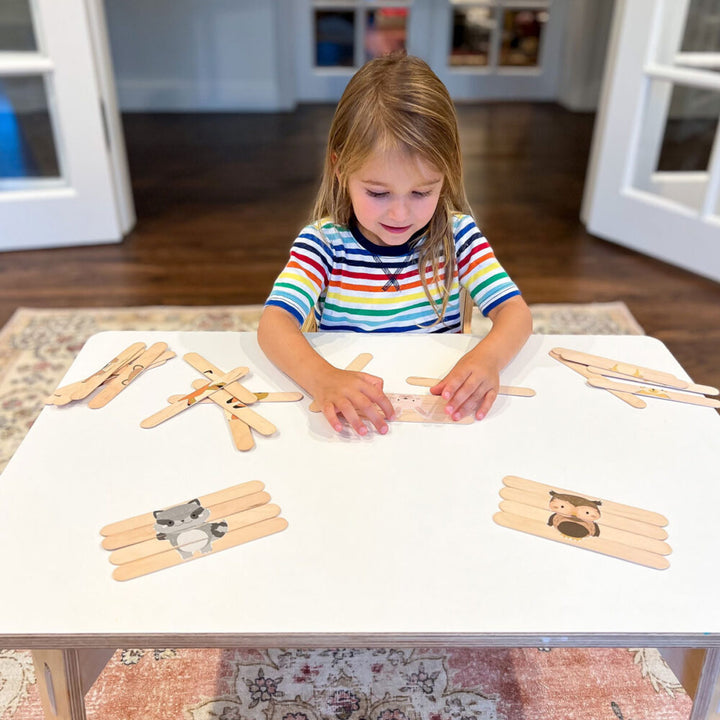Make your own wooden puzzles using craft sticks with these free printable pictures of woodland animals!