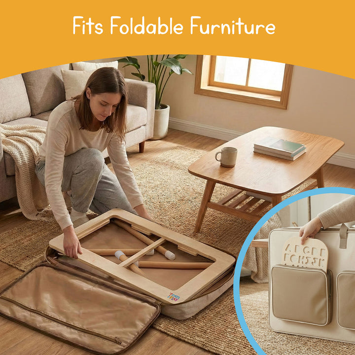 Large storage bag holding a foldable sensory table and play accessories
