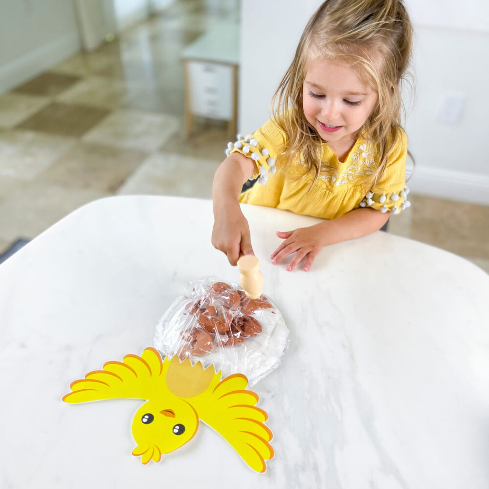 hand eye coordination game for toddlers hatch the egg chick