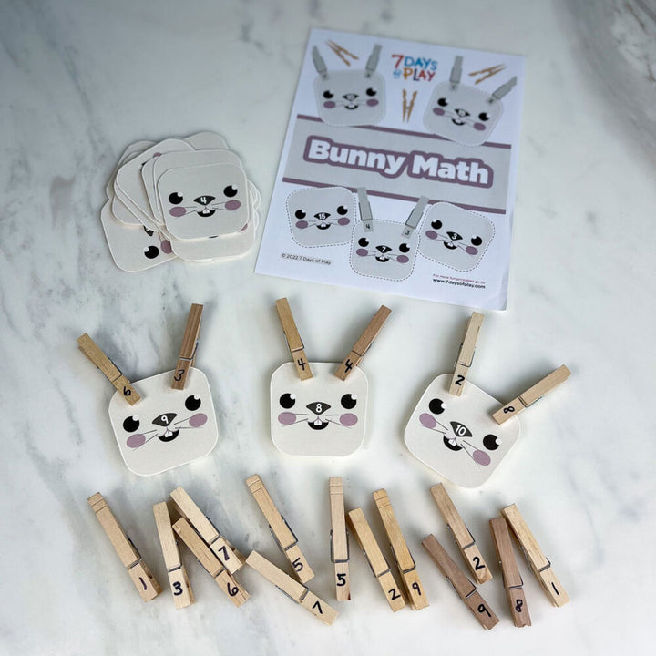 This free printable is a fun, hands on way to do math problems! Use clothing pins as bunny ears to solve the equations whether addition, subtraction, multiplication or division!